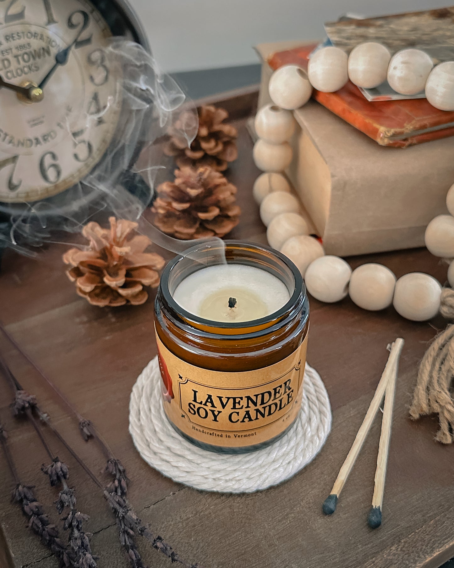 Lavender Soy Candle that was just blown out and has smoke