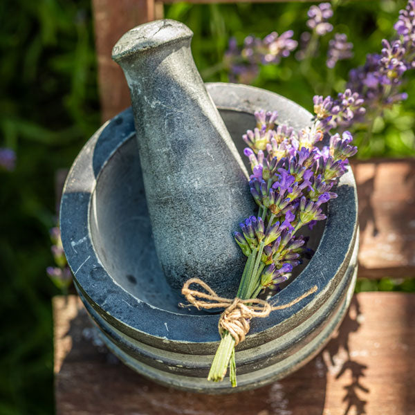Pestle & Mortar with a bundle of lavender