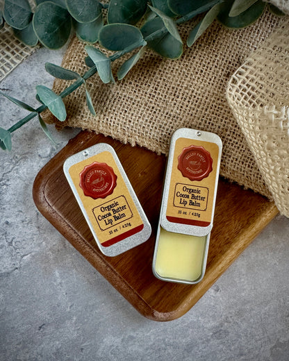 Two tins of Ballou Family Apothecary Lip Balm